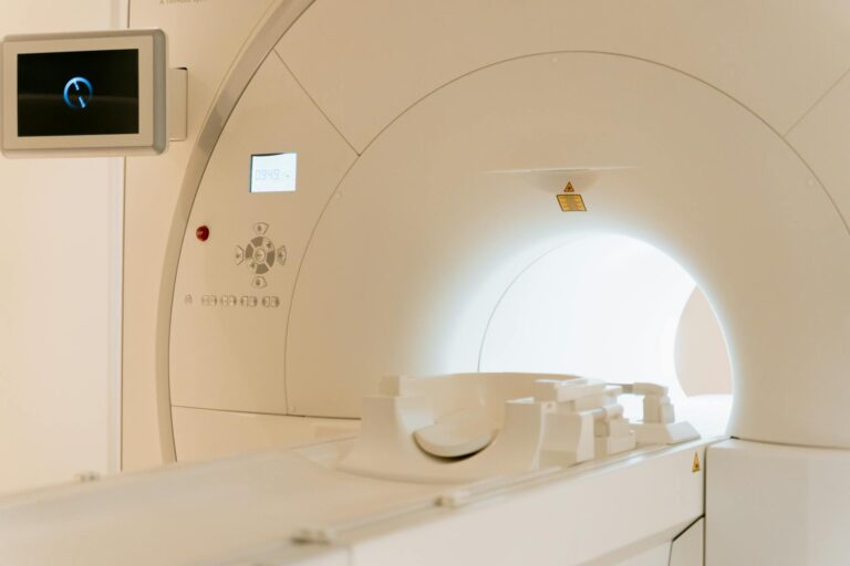 Close-up view of a modern CT scanner in a healthcare facility.