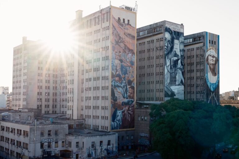 Aerial view of Hospital de Clínicas with vibrant murals in Buenos Aires, Argentina.